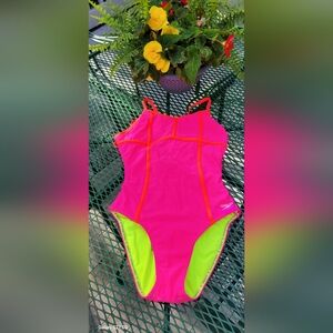 Speedo strappy one piece. Only worn a few times! Super, super cute!